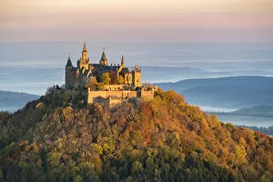 Traditionally German Collection: Hohenzollern castle in autumnal scenery at dawn, Hechingen, Baden-Wurttemberg, Germany