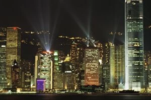 Radiating Collection: Hong Kong Island Central skyline at night from Tsim Sha Tsui, Hong Kong, China, Asia