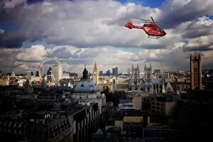 Sky Line Collection: London air ambulance over Westminster, London, England, United Kingdom, Europe