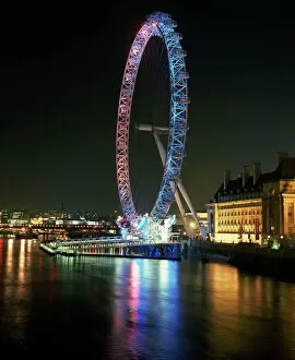 London Eye Photographic Print Collection: London Eye illuminated by moving coloured lights, London, England, United Kingdom, Europe