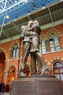 Sculpture Pillow Collection: The Meeting Place bronze statue, St. Pancras Railway Station, London, England, United Kingdom