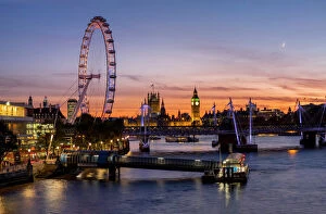 Westminster Framed Print Collection: Millenium Wheel (London Eye) with Big Ben on the skyline beyond at sunset, London