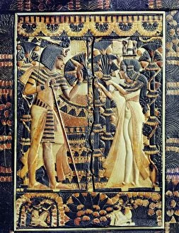 Pharaohs of Egypt Collection: Painted ivory plaque from the lid of a coffer showing Tutankhamun and Ankhesenamun in a garden