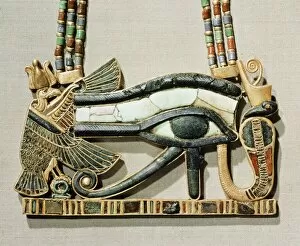 Pharaohs of Egypt Collection: Pectoral of the sacred eye flanked by the serpent goddess of the North