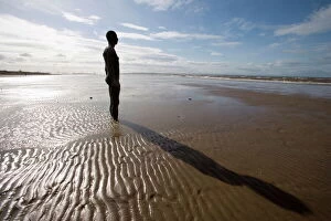 Liverpool Framed Print Collection: Another Place sculpture by Antony Gormley on the beach at Crosby, Liverpool