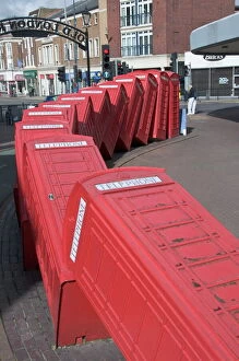 Related Images Cushion Collection: Red telephone box sculpture Out of Order by David Mach. Kingston Upon Thames