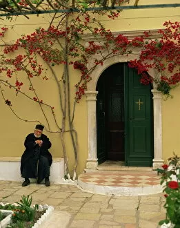 Monk Collection: Resident monk at chapel door, Paleokastritsa Monastery, Corfu, Ionian Islands