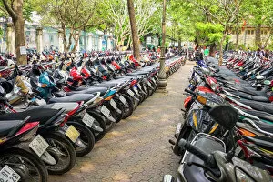 Ho Chi Minh City Collection: Rows of motorbikes parked in central Ho Chi Minh City (Saigon), Vietnam, Indochina