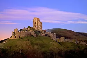 Wareham Collection: The ruins of the 11th century Corfe Castle after sunset, near Wareham, Isle of Purbeck