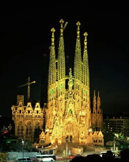 Monuments and landmarks Metal Print Collection: The Sagrada Familia, the Gaudi cathedral, illuminated at night in Barcelona