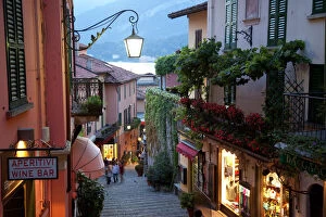 Street Light Collection: Shopping street at dusk, Bellagio, Lake Como, Lombardy, Italy, Europe