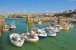 Newquay Poster Print Collection: Small fishing boats in the harbour at high tide, Newquay, North Cornwall