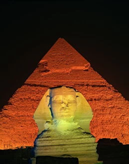 Egyptian pyramids and tombs Pillow Collection: The Sphinx and one of the pyramids illuminated at night, Giza, UNESCO World Heritage Site