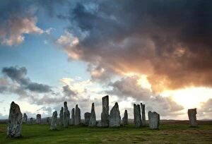 Landmarks of the past Metal Print Collection: Standing Stones of Callanish at sunset with dramatic sky in the background, near Carloway