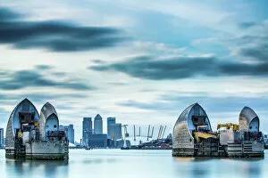 International Architecture Canvas Print Collection: Thames Barrier on River Thames and Canary Wharf in the background, London, England