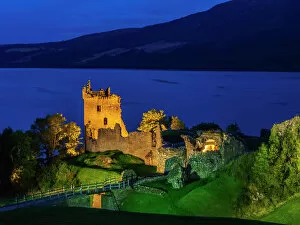 Architectural heritage Collection: Twilight view of Urquhart Castle and Loch Ness, Highlands, Scotland, United Kingdom