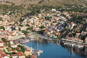 Dodecanese Islands Collection: View over the colourful harbour, Gialos (Yialos), Symi (Simi), Rhodes, Dodecanese Islands