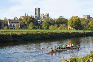 Rowing Boats Collection: View across the River Wear to Durham Cathedral, female college rowers in training, Durham