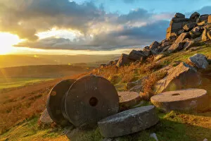 Related Images Collection: View of sunset and old millstones at Curbar Edge during autumn, Derbyshire, Peak