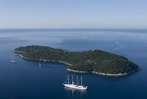 Croatia Photo Mug Collection: Yacht sailing round the island of Lokrum, part of the Elaphite Islands