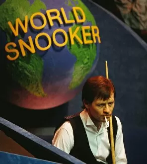 Snooker Pillow Collection: Alex Higgins has a cigarette at the 1987 Embassy World Snooker Championship