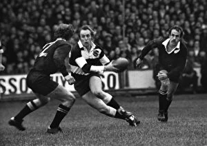 Rugby Photographic Print Collection: David Duckham dummies for the Barbarians in the famous game against the All Blacks in 1973