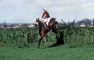 Huntly Pillow Collection: Red Rum clears the last on the way to winning the 1977 Grand National