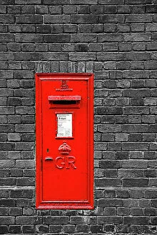 Boxes Collection: Red English Post Box in a brick wall