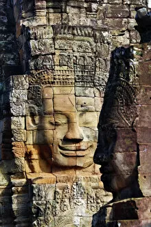 Temple Collection: Stone head and face at Bayon Khmer Temple, Angkor Thom, Cambodia