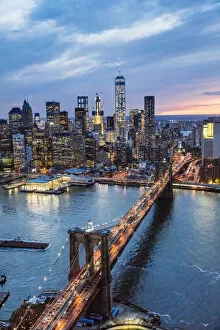 Tower Bridge Framed Print Collection: Aerial of lower Manhattan skyline and Brooklyn bridge at dusk, New York, USA