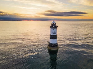 Wales Pillow Collection: Aerial view of Trwyn Du Lighthouse at sunset, Llangoed, Gwynedd, Anglesey, Wales, Great Britain