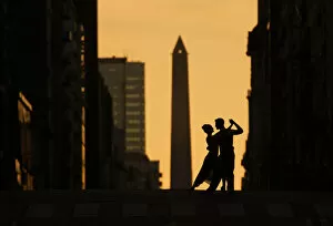 Passion Collection: A couple of Professional Tango dancers on Avenida Corrientes at sunset