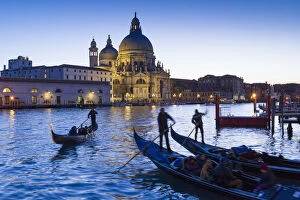 Basilica Collection: Gondolas and Santa Maria della Salute at dusk. Venice, Veneto, Italy