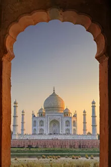 Memorials Pillow Collection: India, Taj Mahal at sunset framed by a temple arch