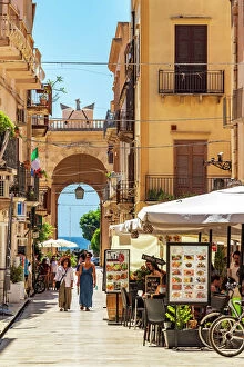 Related Images Pillow Collection: Marsala, Sicily. People visiting the town centre with restaurants