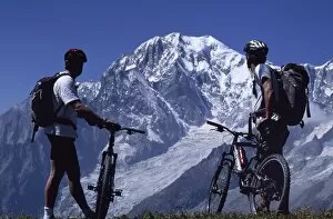 Model Released Collection: Mountain bikers stop on their circuit of Mont Blanc