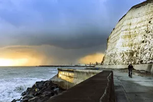 Brighton & Hove Photo Mug Collection: Storm clouds over the English Channel near Brighton with the white cliffs of Peacehaven