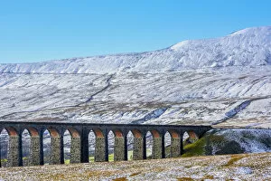 Carlisle Collection: UK, England, North Yorkshire, Ribblehead Viaduct and Whernside mountain, one of the