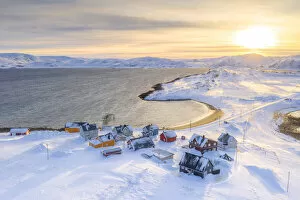 Barents Sea Collection: Veines village covered with snow lit by sunrise, Kongsfjord, Varanger Peninsula
