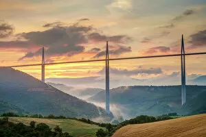 Landscape paintings Poster Print Collection: Viaduc de Millau bridge over Tarn river valley at sunrise, Millau, Aveyron Department
