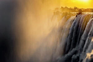 Livingstone Poster Print Collection: Victoria Falls at sunset, Livingstone, Zambia