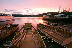 Ambleside Fine Art Print Collection: Rowing boats at Waterhead Ambleside on Lake Windermere at sunset in the Lake District UK