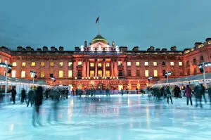 Skating Collection: Skaters, early evening on the seasonally assembled ice rink at Somerset House, London
