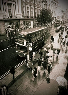 Framed Print Collection: UK London Oxford Street Shoppers in the rain