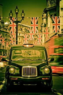 Taxies Collection: UK. London. Regent Street. Union Jack decorations for Royal Wedding