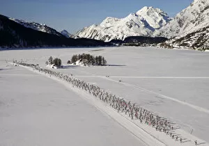 Landscape paintings Jigsaw Puzzle Collection: An aerial view shows cross-country skiers racing during Engadin Ski Marathon in village