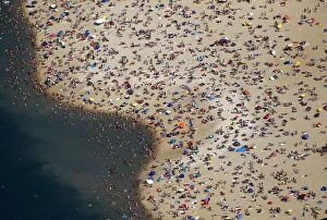 Netherlands Photo Mug Collection: An aerial view shows people at a beach on the shores of the Silbersee lake on a hot
