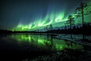Aurora Borealis Canvas Print Collection: The Aurora Borealis (Northern Lights) is seen over the sky near Rovaniemi in Lapland