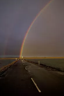 Related Images Collection: Rainbow over Lindisfarne causeway Holy Island Northumberland autumn