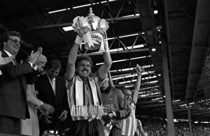 Football Pillow Collection: Coventry City captain Brian Kilcline lifts the FA Cup after his teams 3-2 victory